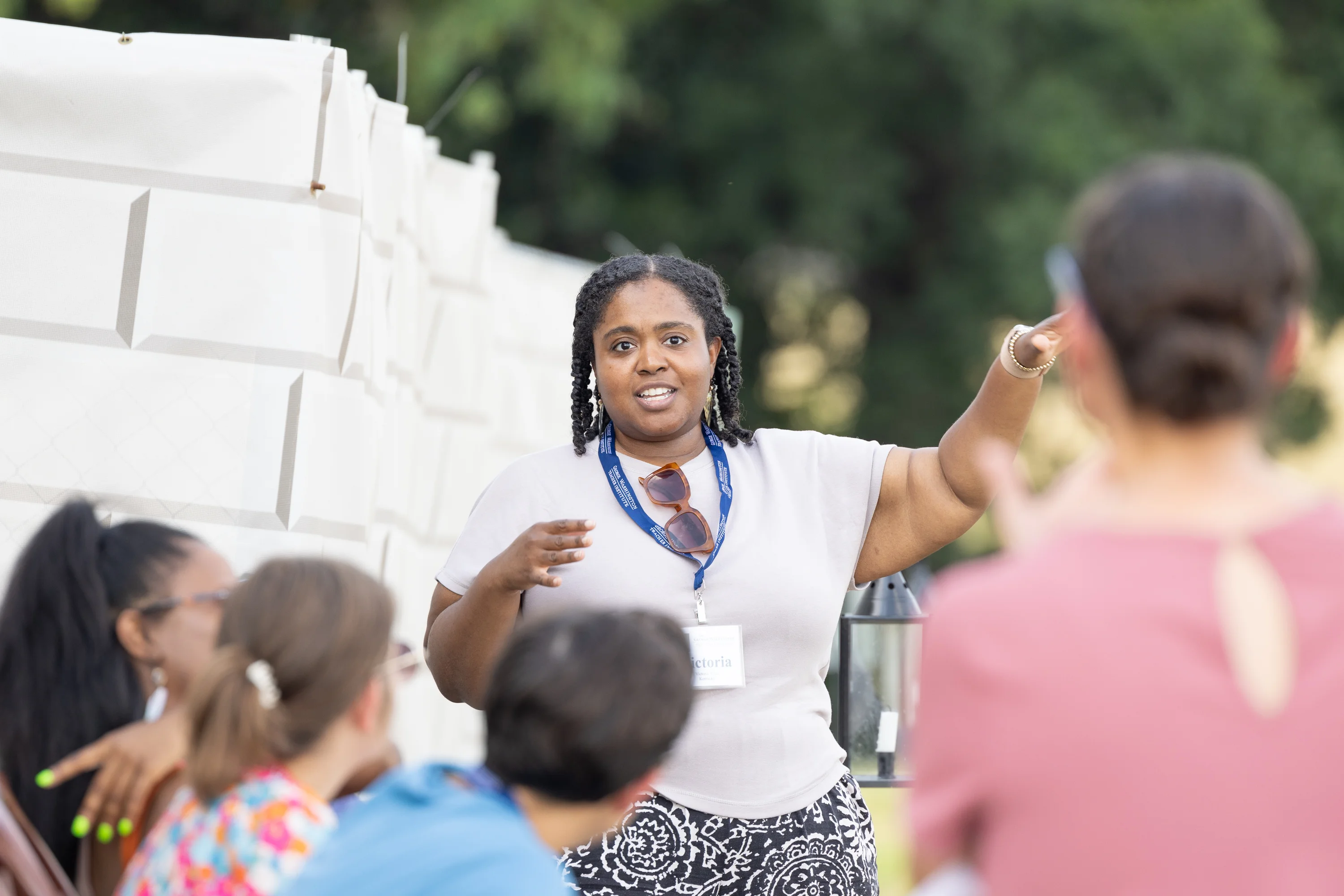 GWTI participant speaking in front of a crowd