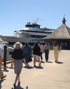 Group walking towards boat