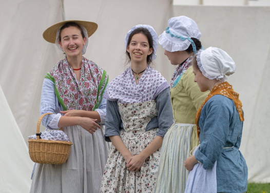 See the Camp Followers go through their daily life