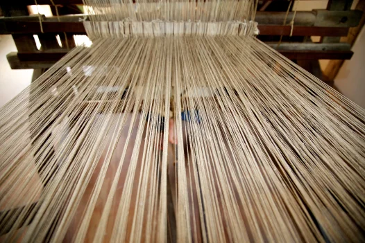 linen spun on loom in spinning house