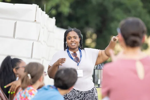 GWTI participant speaking in front of a crowd