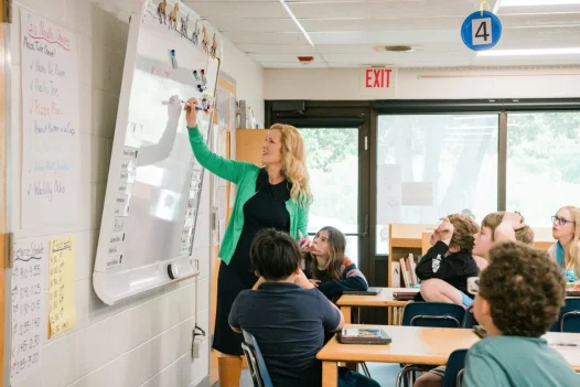 Teacher in a classroom with children