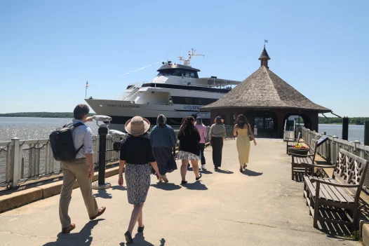 Group walking towards boat