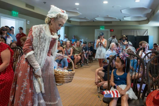 Martha Washington interacting with guests