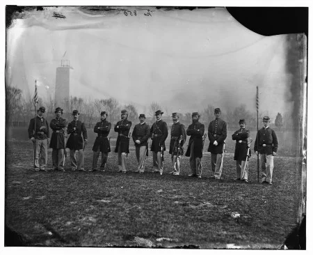 Union army officers posing in front of the unfinished Washington Monument, Library of Congress.