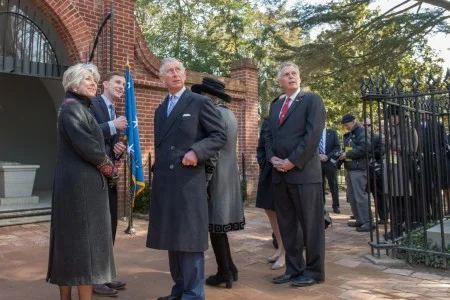 His Royal Highness Charles, the Prince of Wales, and Her Royal Highness Camilla, the Duchess of Cornwall, admire the English yew planted by Edward, Prince of Wales, in 1919 at Washington's Tomb. (MVLA)