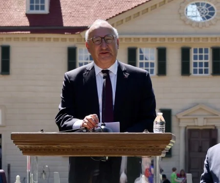 Philippe Étienne speaks on the bowling green at Mount Vernon. (MVLA)