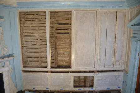 Behind the Front Parlor east wall paneling. 