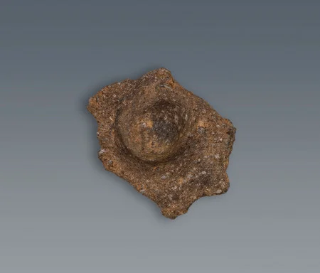 A “lug” handle for a ceramic pot. Note the crushed steatite mixed into the clay body of the fragment. (MVLA)