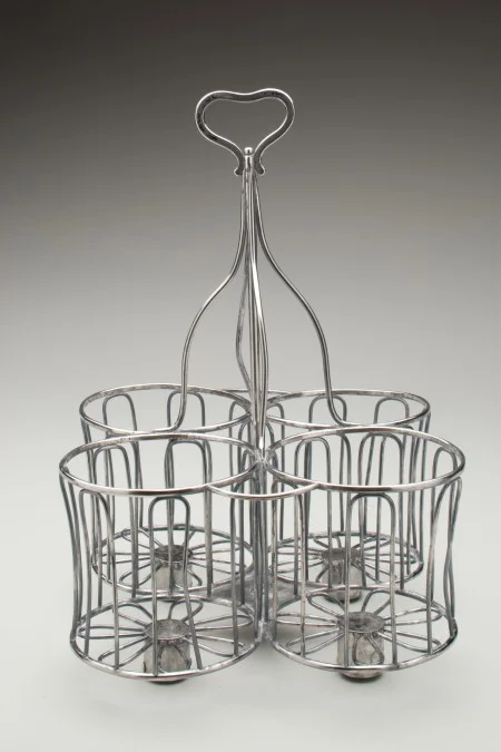 Upon his retirement from the presidency, George Washington brought this bottle roller and its mate to Mount Vernon, where they continued to facilitate the orderly flow of wine at dinner. Gift of Mary Lee Bowman and Robert E. Lee, IV, 2007 [W-4578]