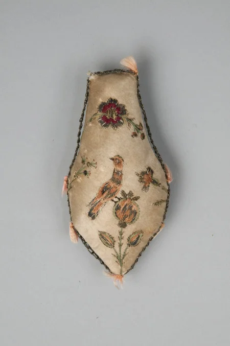 Martha Washington is believed to have embroidered this elegant pincushion during the winter encampment at Valley Forge , 1777-1778, W-2738/B, MVLA.