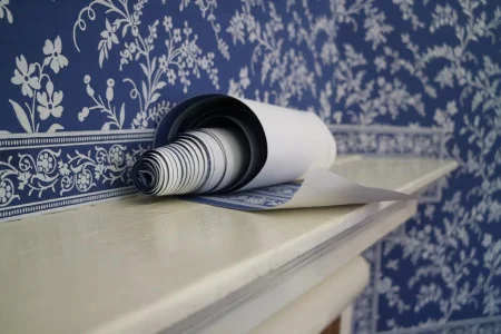 The reproduction wallpaper in the room came from the pattern books of Jean-Baptiste Réveillon, who operated the royal French wallpaper manufactory. (MVLA)