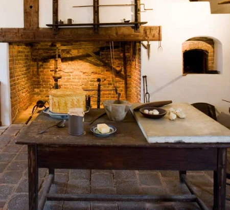 This is the kitchen at Mount Vernon. Enslaved cooks made bread, pies, and cakes here.