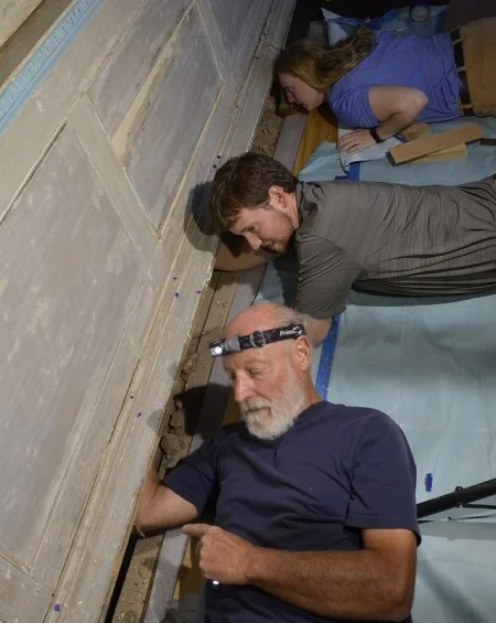 Investigating the framing behind the east wall. MVLA.