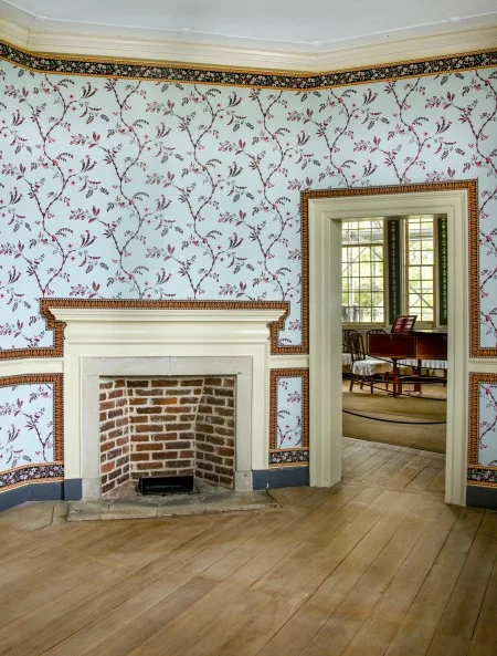 View of the fireplace and mantel in the Little Parlor.