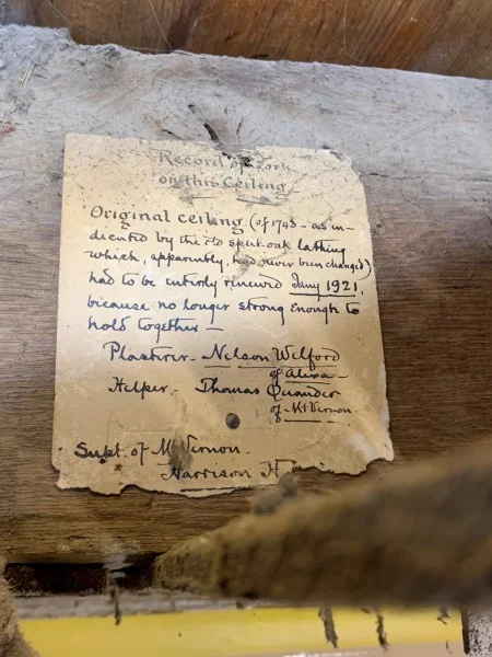 A handwritten note from Dodge on Mount Vernon letterhead was found tacked to the side of a ceiling joist. The “Helper” listed, Thomas Quander, was a descendant from one of the families enslaved at Mount Vernon in the 19th century. (MVLA)