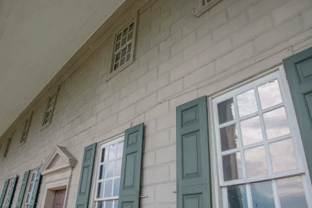 A sampling of shutters on the east elevation of the Mansion prior to 2022-23 restoration work.