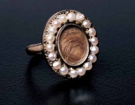 Family history suggests this ring was worn by Martha Washington to honor the memory of her nephew George Augustine Washington, who died in 1793. Martha Washington’s family and friends would have had similar pieces made with the money she bequeathed them. [W-1976]