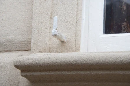 Close up of a pintle on the west front after the 2019 restoration work, MVLA.