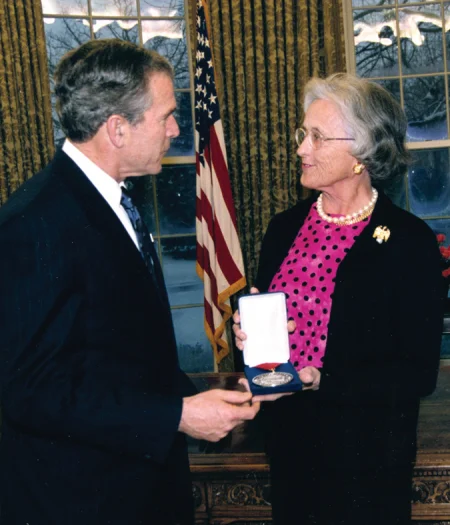 Mrs. Walton accepting the National Humanities Medal on behalf of the Association in 2003 from President George W. Bush for dedicated service to the nation. MVLA. 