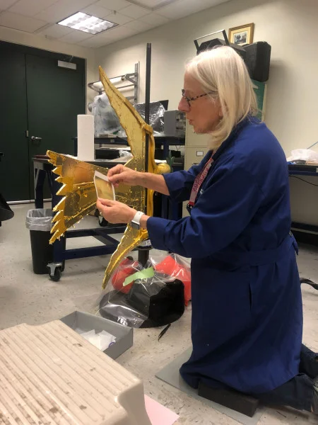 Re-gilding the Dove of Peace weathervane, MVLA.