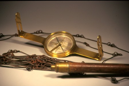 One of the most important tools of the trade was a surveyor's compass. When mounted on a staff, the compass enabled the user to establish a line from a known reference point to the point of interest and determine its bearing. MVLA [W-579/A-B]