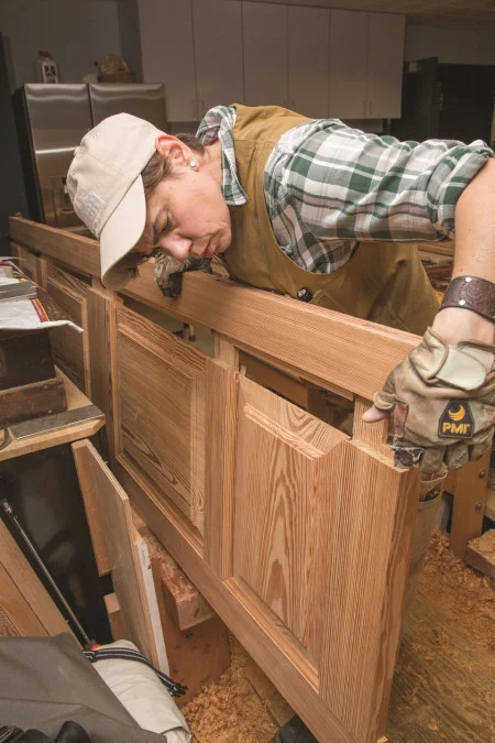 The molding is a prominent decorative feature that often covers the edges of two pieces of wood. The grooves in the center of each beam indicate where the panels will sit.