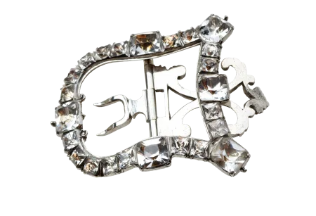 This silver buckle was likely acquired by Martha Washington during her first marriage to Daniel Parke Custis, and may have been used by her to accent a sash around her waist or fasten a shoe. London, England, ca. 1740-1760. Silver, glass, and gold. Purchased with funds donated by Mrs. William H. Borthwick, Vice Regent for California, and Mr. Borthwick, 2008. The Mount Vernon Ladies' Association.