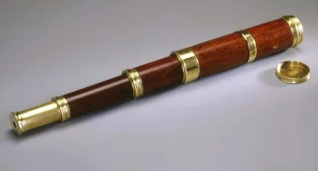 By allowing viewers to see extended distances, spyglasses performed both aesthetic and practical functions. The standing man in Latrobe’s piazza scene peers toward the river – is he examining details of the carefully composed landscape, or searching for oncoming ships? Could this spyglass – thought to be one of several owned by George Washington – be the spyglass shown in the drawing? (MVLA, [W-644])
